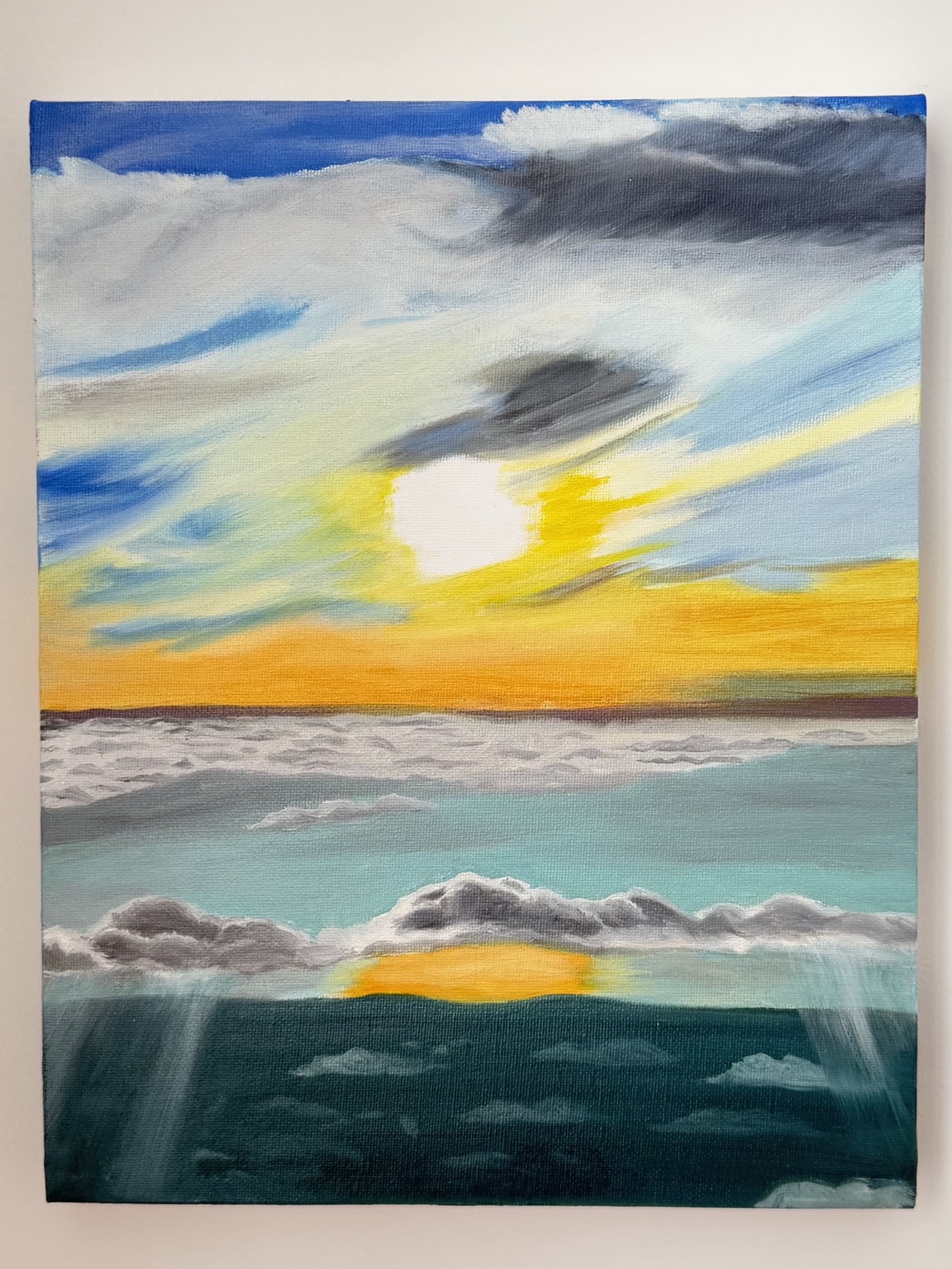 St.Augustine, An ocean sunset beneath sweeping clouds and a yellow sky