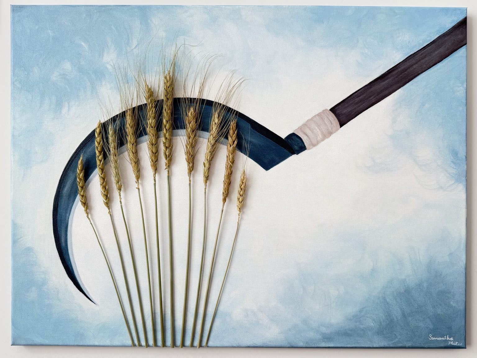 The Harvest, Golden wheat stalks gathered against a curved dark harvesting blade and a pale blue sky